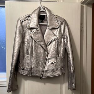 Not wearing it anymore. Still in excellent condition.